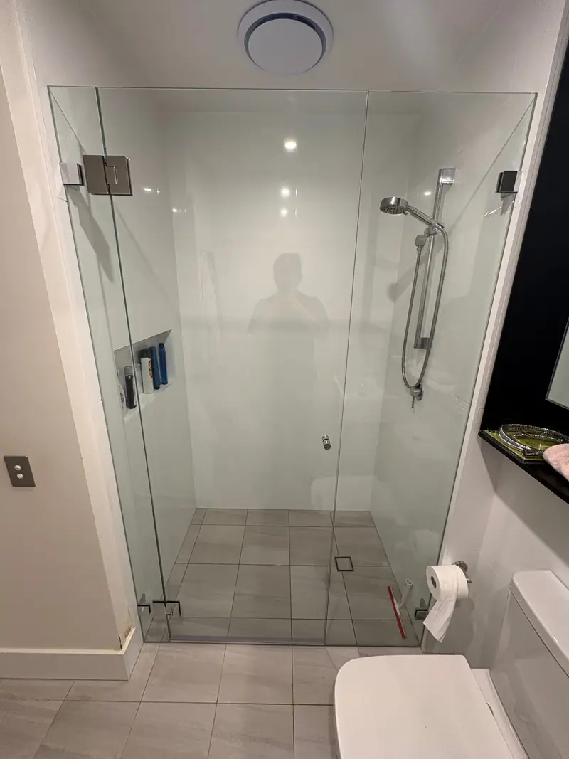 Custom frameless shower screen door and fixed panel